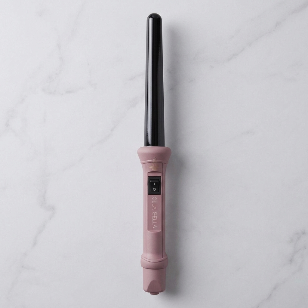 Olla Bella 1" Ceramic Curling Wand in Ballet Pink on marble countertop