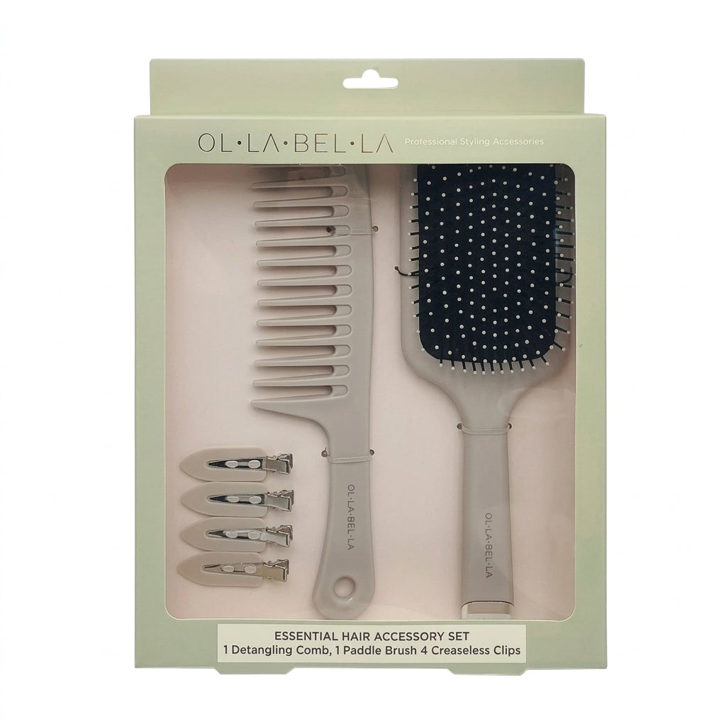 The Olla Bella Knot Today Detangling Brush Kit in its original packaging, containing a detangle brush, paddle brush, and four creaseless sectioning clips in a light sage green box.