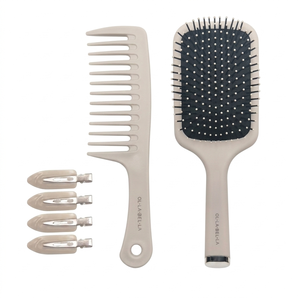The Olla Bella Knot Today Detangling Brush Kit featuring a detangle brush, a paddle hairbrush, and four creaseless sectioning clips, all in a light beige color.